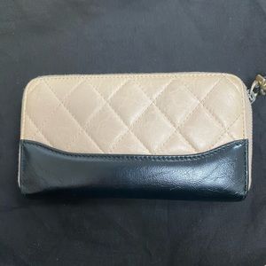 CHANEL
Aged Calfskin Quilted Small Gabrielle Zip Around Wallet Beige Black